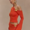 Ainsley Asymmetrical Long Sleeve Top With Floral Hardware – Burnt Orange Ainsley Asymmetrical Long Sleeve Top With Floral Hardware – Burnt Orange