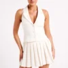 Mura Pleated Mini Skirt – Ivory Mura Pleated Mini Skirt – Ivory