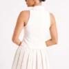 Mura Pleated Mini Skirt – Ivory Mura Pleated Mini Skirt – Ivory