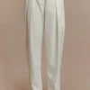 Penelope Pleated High Waisted Pants – Ivory Penelope Pleated High Waisted Pants – Ivory