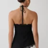Theodosia Asymmetric Lace Halter Top – Black Theodosia Asymmetric Lace Halter Top – Black