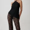 Theodosia Asymmetric Lace Halter Top – Black Theodosia Asymmetric Lace Halter Top – Black